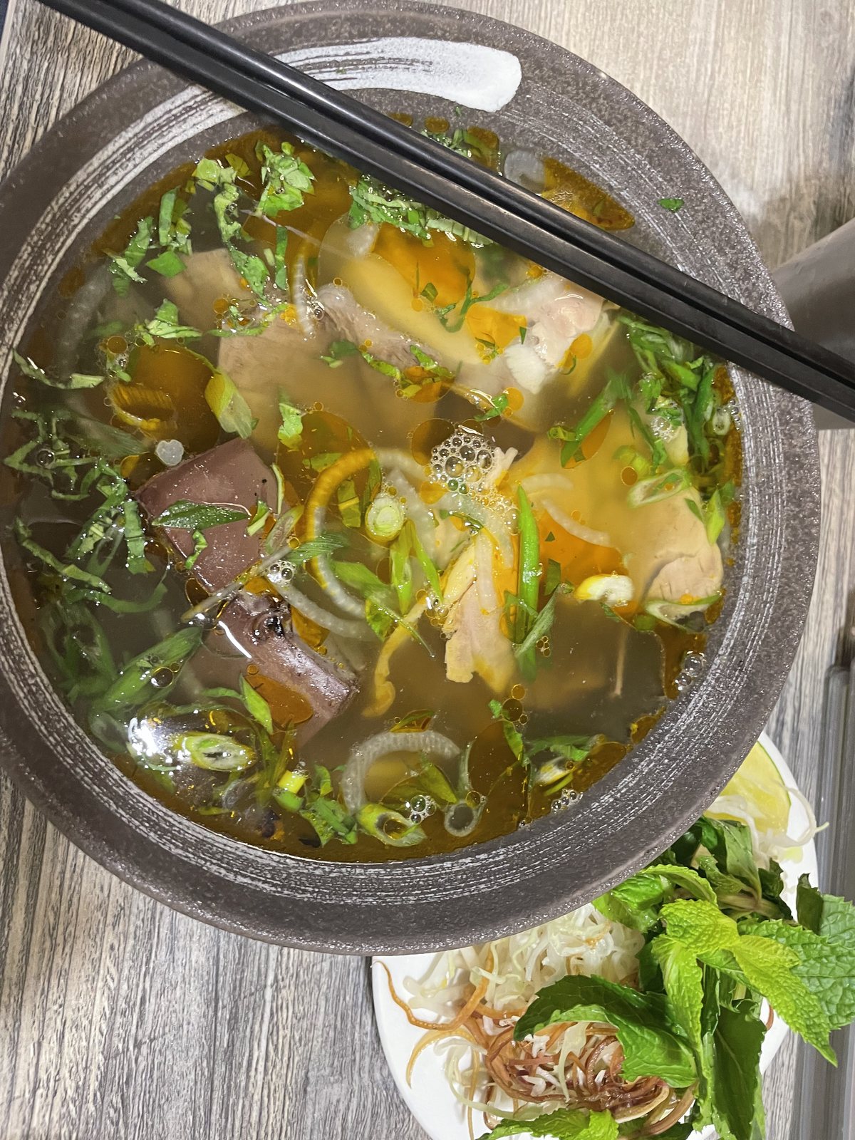 Bún bò Huế with herbs