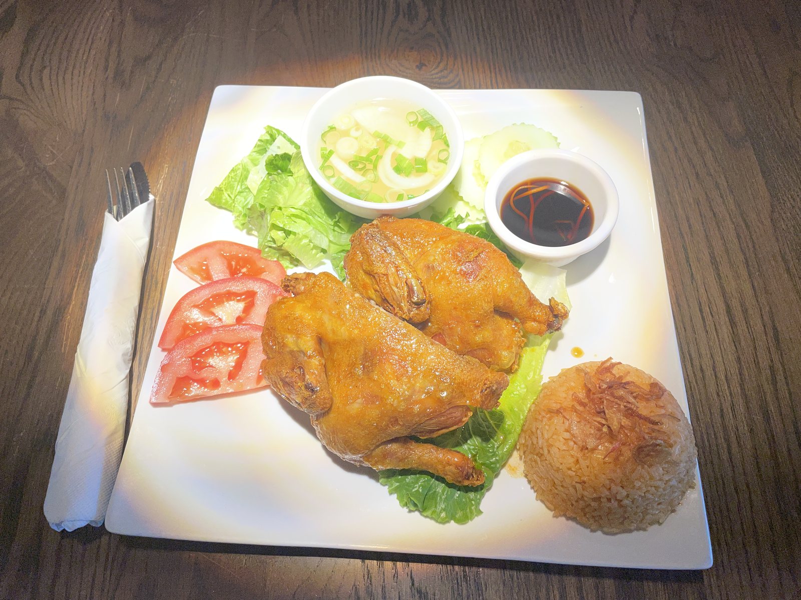 Fried Cornish hen with red rice
